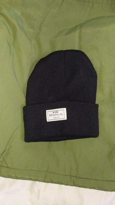 Зимова курточка для хлопчика зеленого кольору 123-128 6-7 років шапка