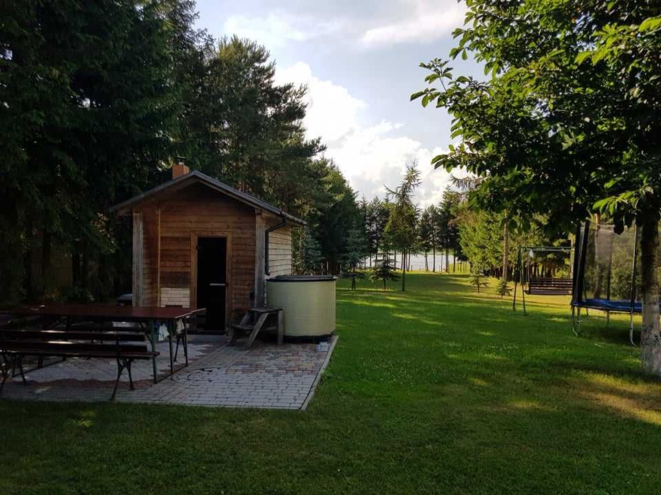 Domki letniskowe/apartamenty na Mazurach nad jeziorem (sauna, rowerki)