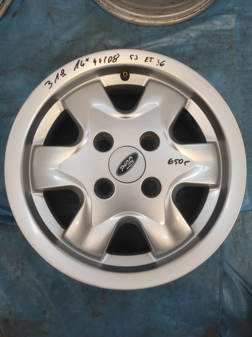 319 Felgi aluminiowe ORYGINAŁ FORD R 14 4x108 otwór 63,3 mm