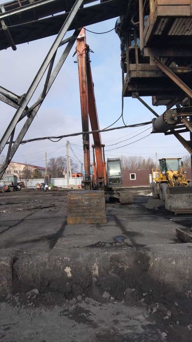 Услуги гусеничного экскаватора с глубиной копания до 15 метров