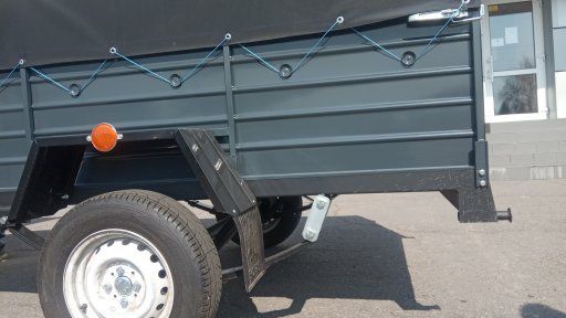 Причіп спеціалізований ПА 23 на ресорах Волга з двома бортами