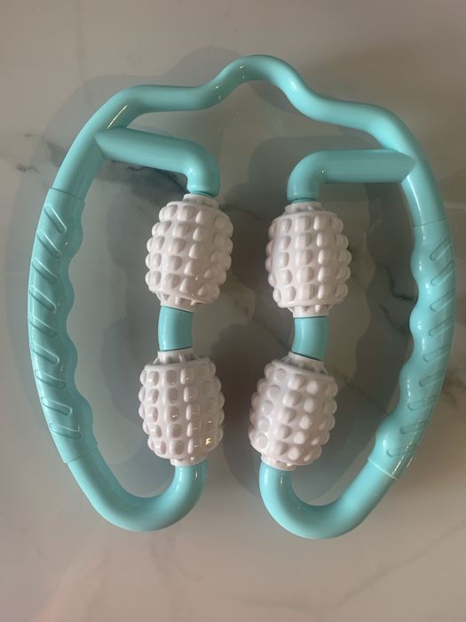 Масажор роликовий