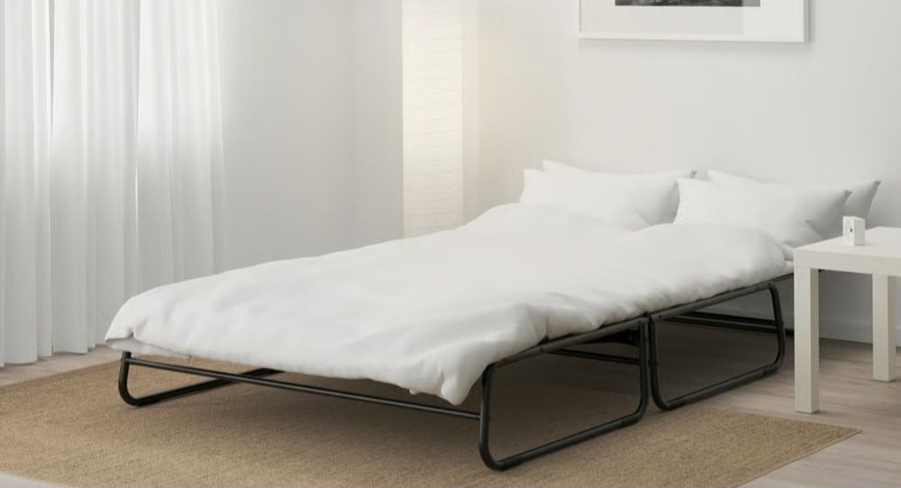 Sofá-cama usado apenas uma vez