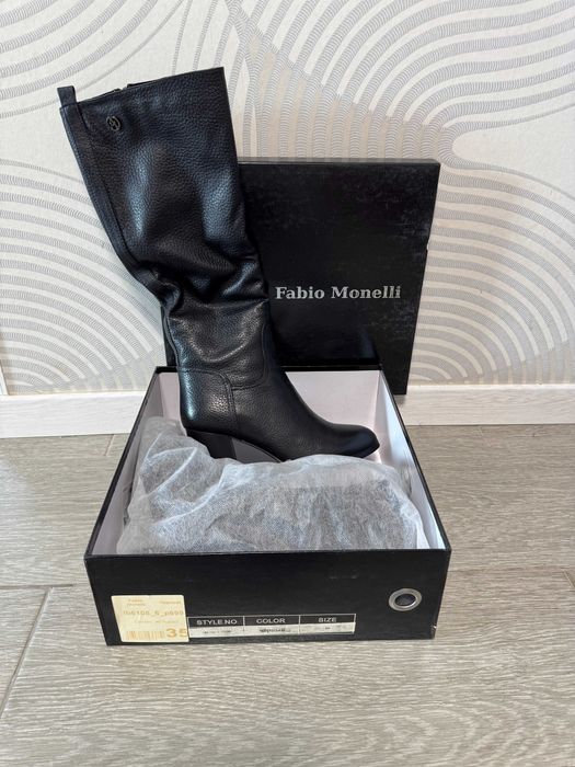 Зимние кожаные сапоги