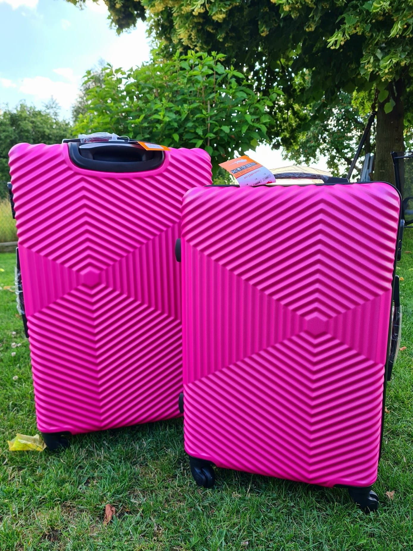 Komplet nowych walizek Cocodivo Large I ExtraLarge różowe plastikowe