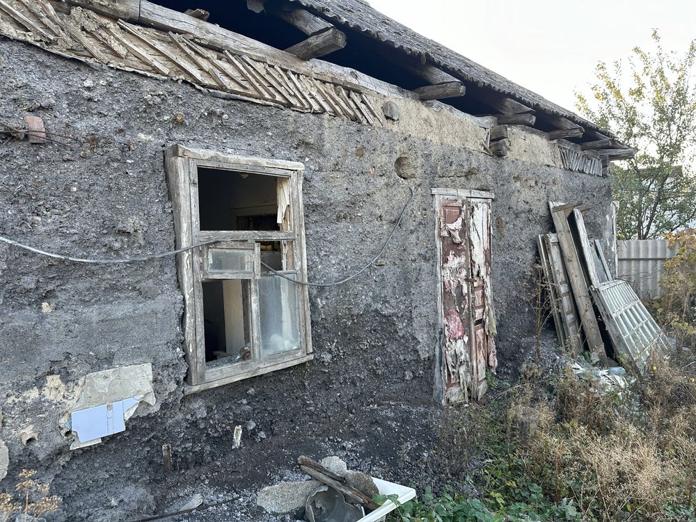 Ділянка в центрі міста, старий дім