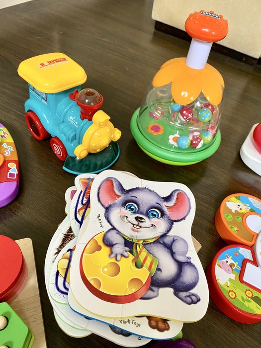 Дитячі розвиваючі іграшки Chicco, Fisherprice, Haba