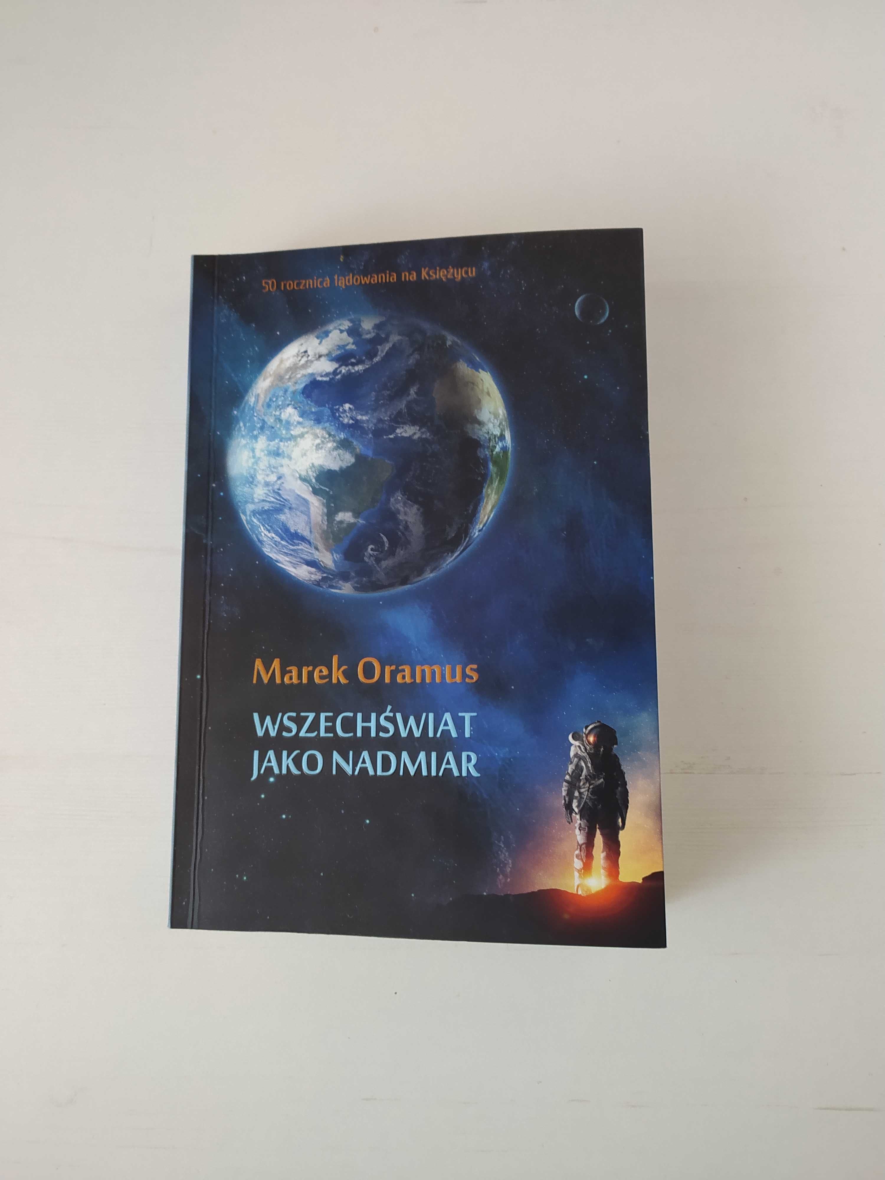 Marek Oramus- Wszechświat jako nadmiar