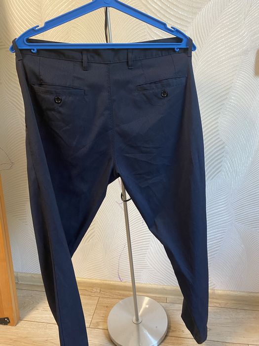 Брюки темно синие в мелкую клетку на мужчину или подростка