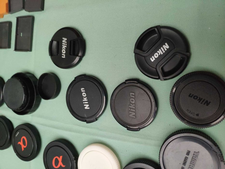 Tamps de máquinas e objetivas fotográficas Canon Nikon, Sigma Tamron,