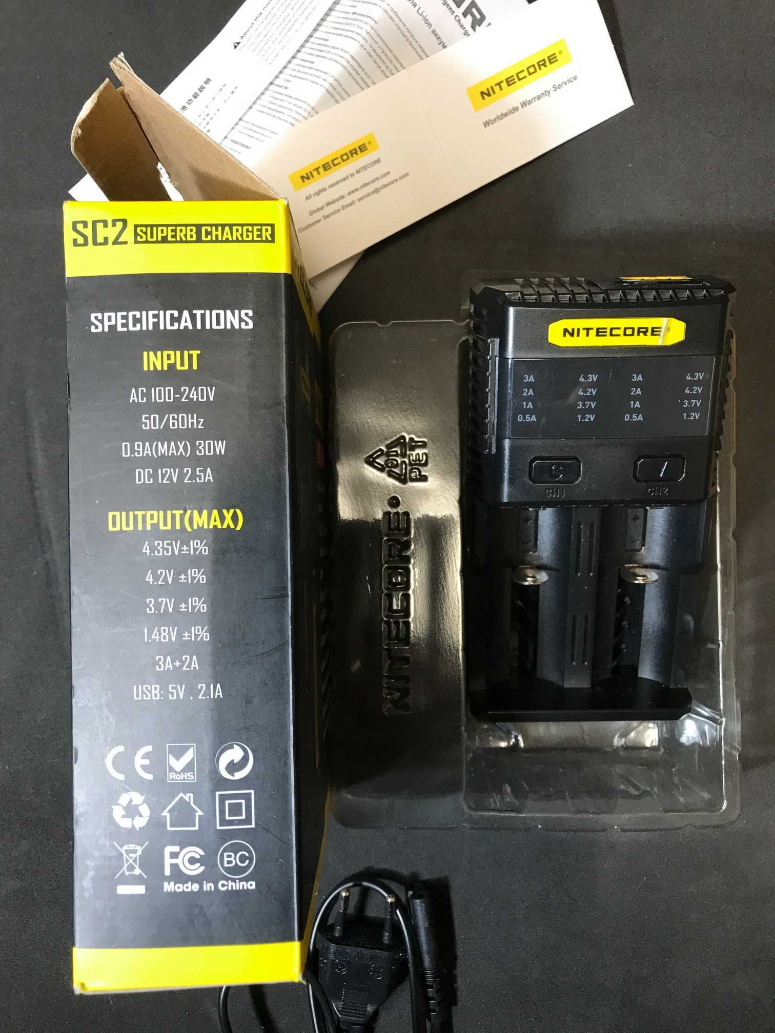 Продам универсальное зарядное устройство Nitecore SC2 Superb Charger