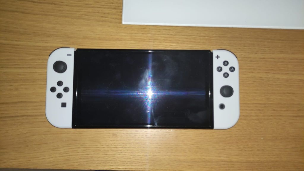 Nintendo Switch OLED [1 mês de utilização e com Garantia]