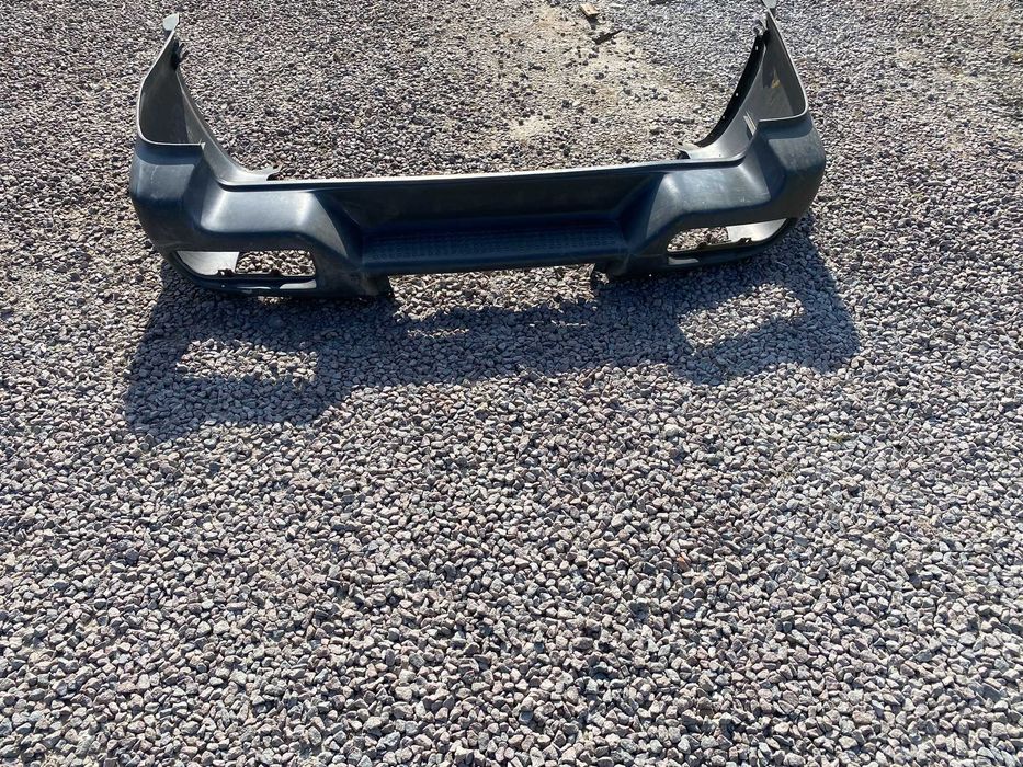 Бампер задній Nissan Terrano I