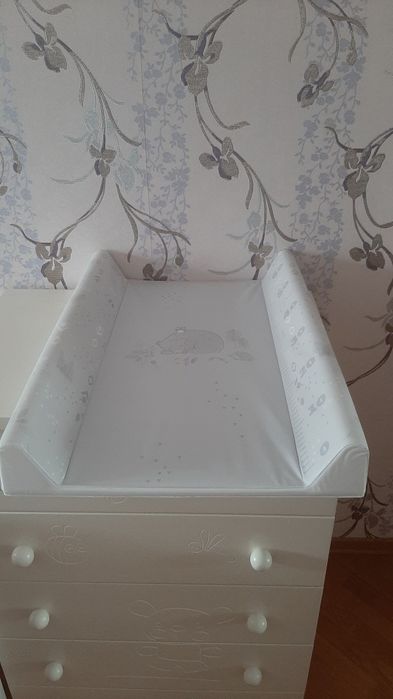 Пеленальна дошка для сповивання