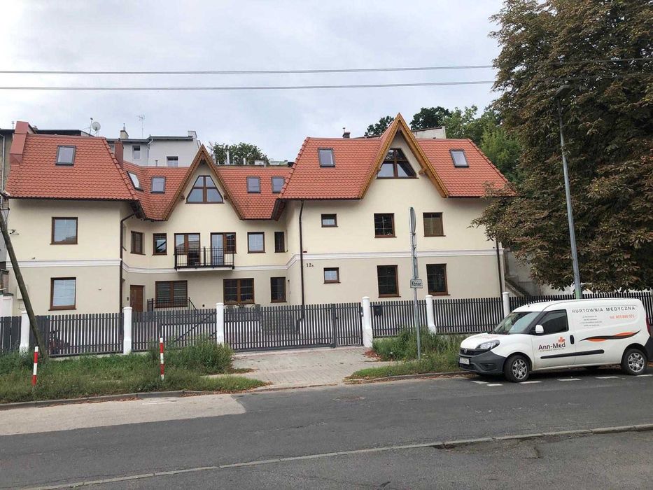 Nowa, nowoczesna kawalerka z oddzielną sypialnią na Śródmieściu