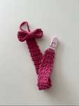 Suporte de chucha em croché com laço – Rosa