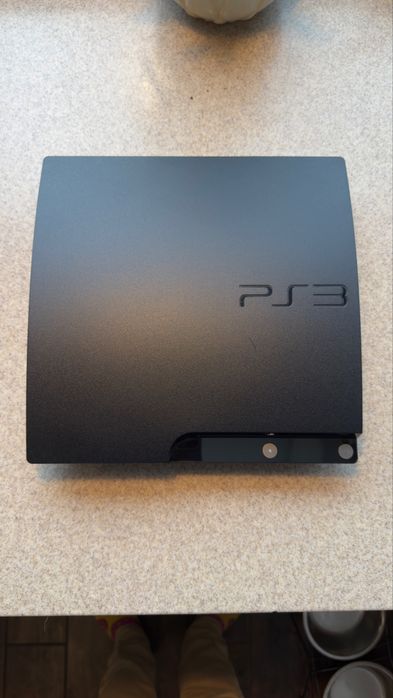 PS3+2 pady + 3 gry