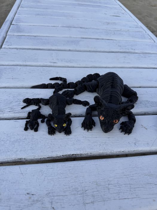 Рухомі фігурки котів сфінксів з 3D-принтера