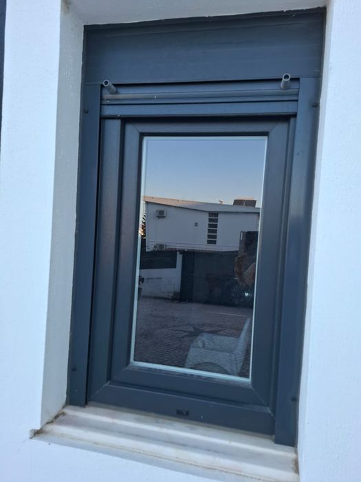 Janela em pvc com estore
