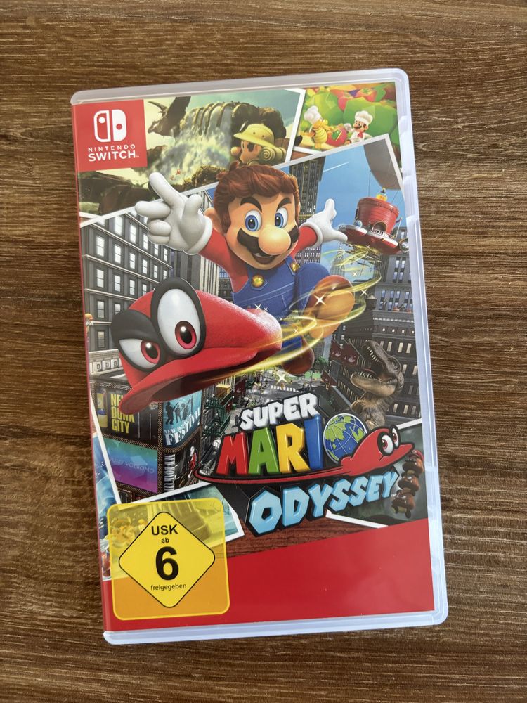Nintedno Switch OLED + gry + Ring fit