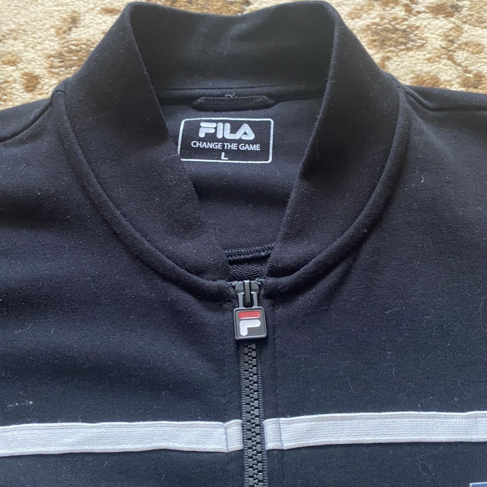 Олімпійка Fila.