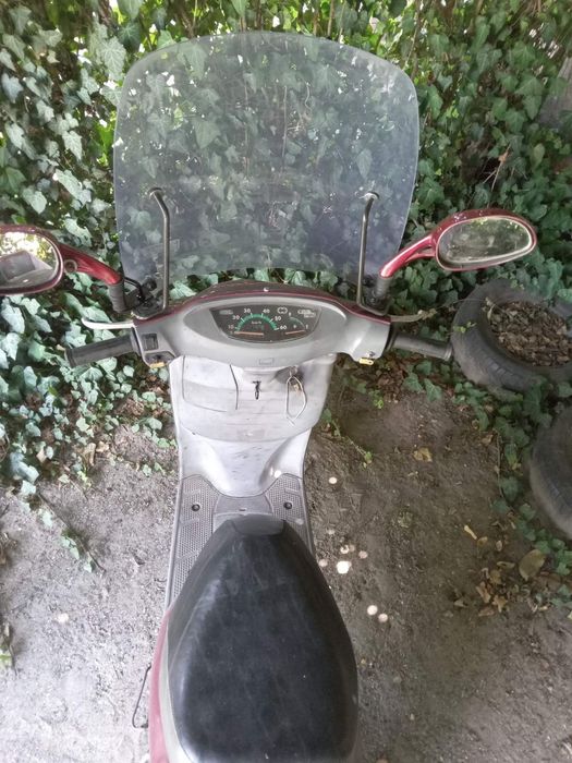 Продам скутер Ноnda  Topik, на ходу. С прицепом