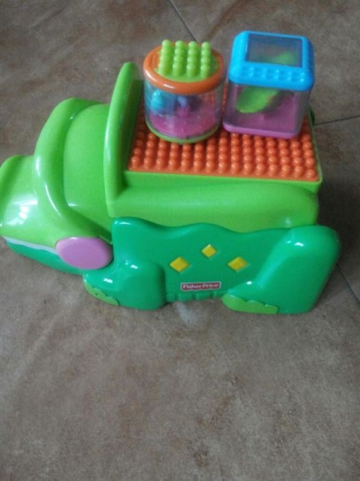 Krokodyl fisher price z klockami grajacy