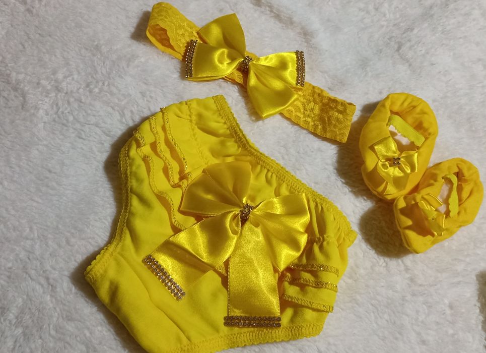 Vendo Tapa fralda + lacinho + sapatinho