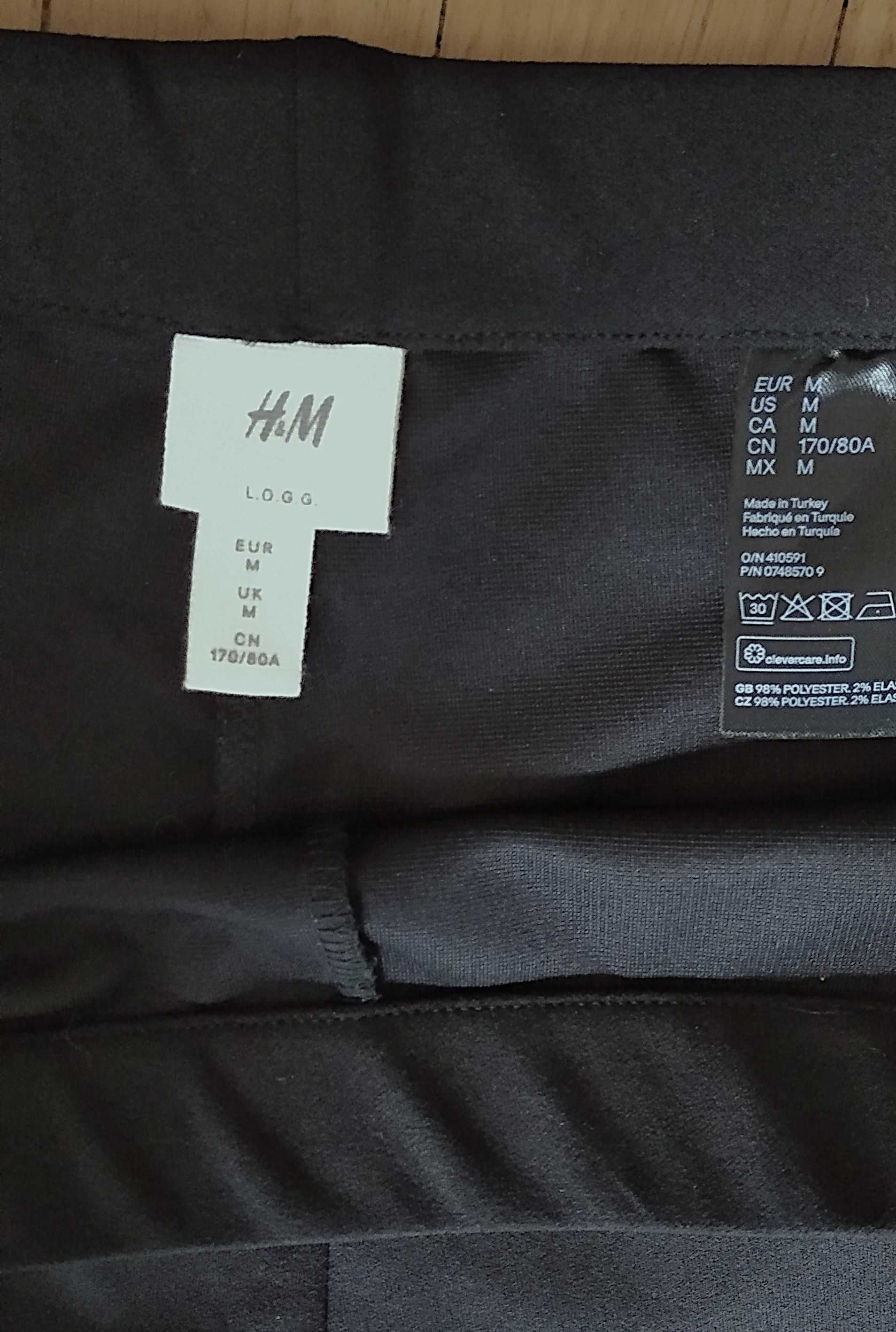 H&M - czarne, szerokie spodnie z lampasem - M/L
