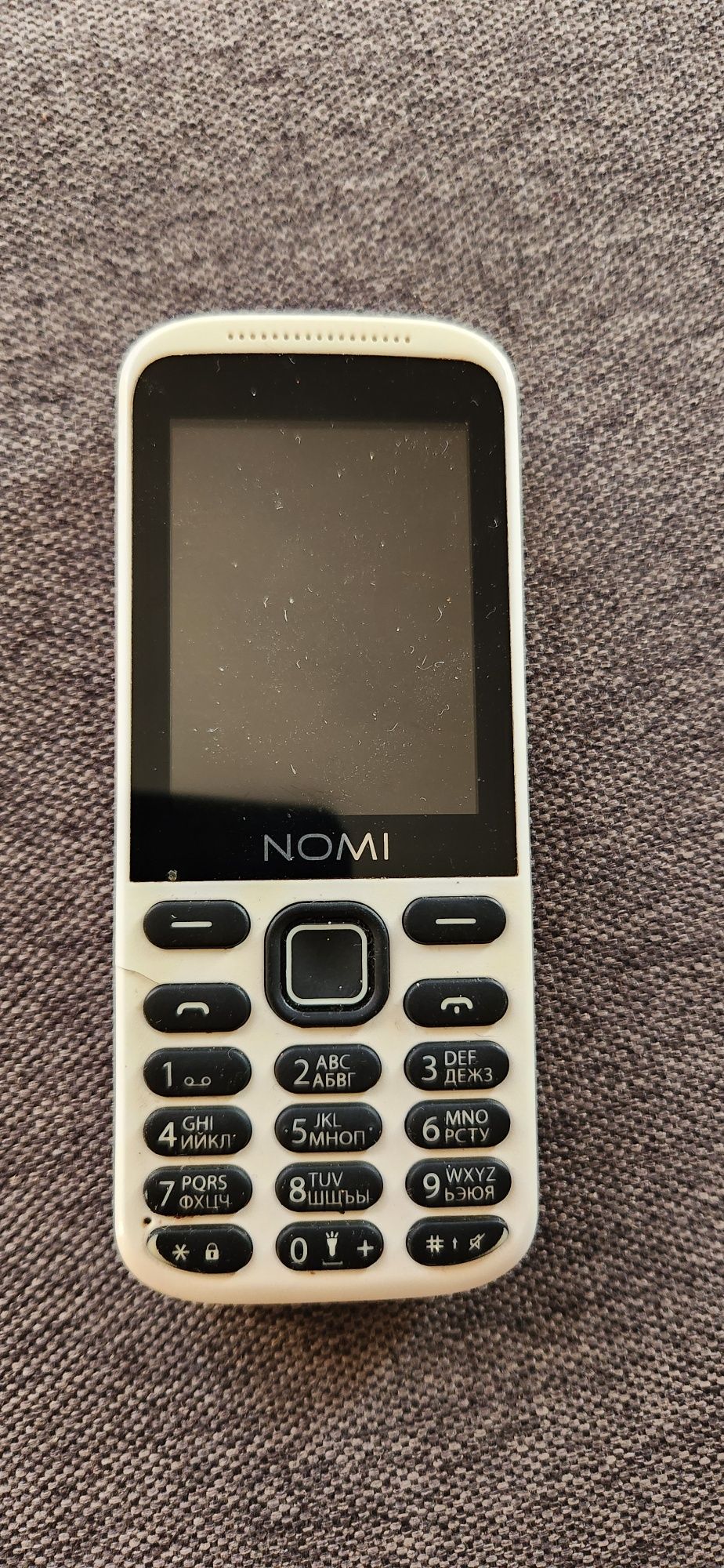 Телефон      Nomi