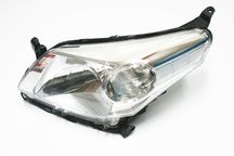 Lampa lewa przód reflektor OE Toyota Urban Cruiser NLP11 NOWA oryginał