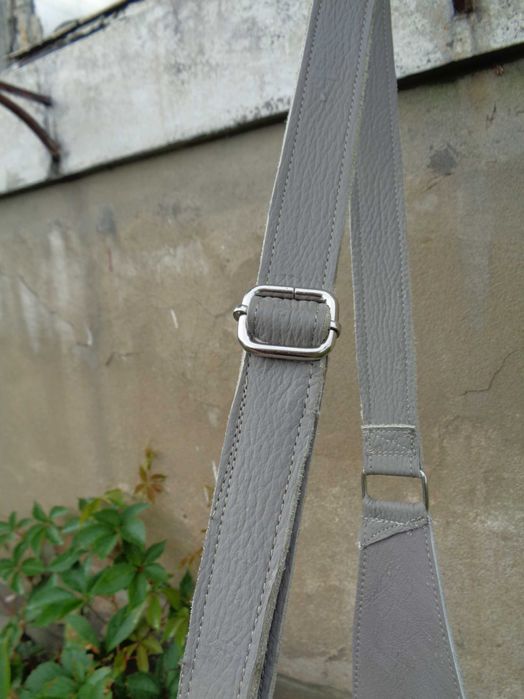 Artystyczna torebka skórzana z głową kobiety. Handmade