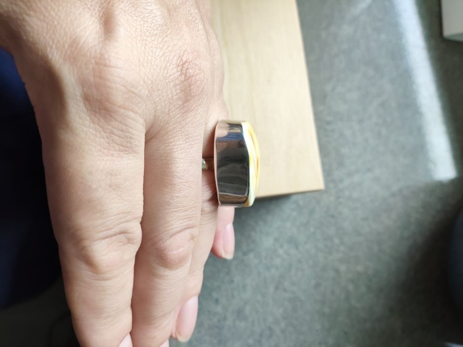 Srebrny pierścionek z bursztynem regulowany srebro