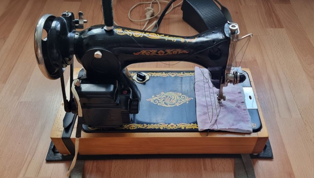 Швейная  машина...