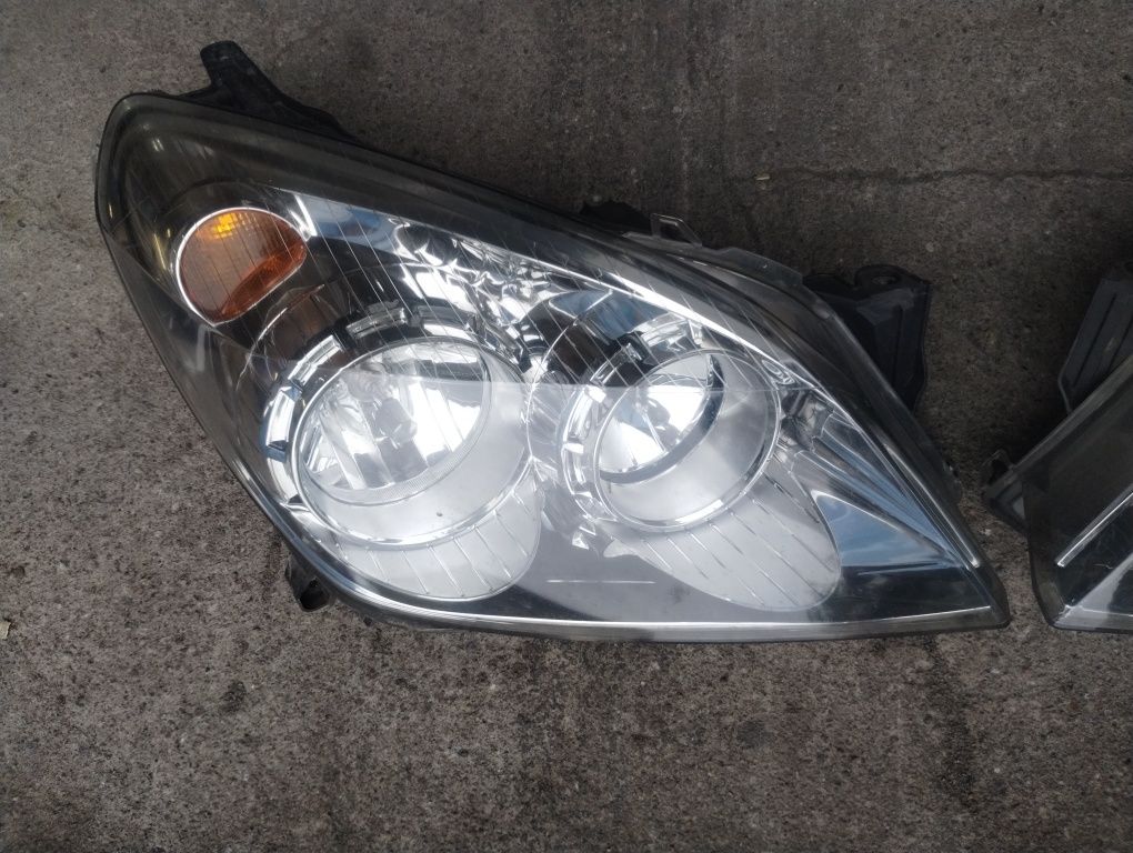 Opel Astra h III lampy  komplet przód lift