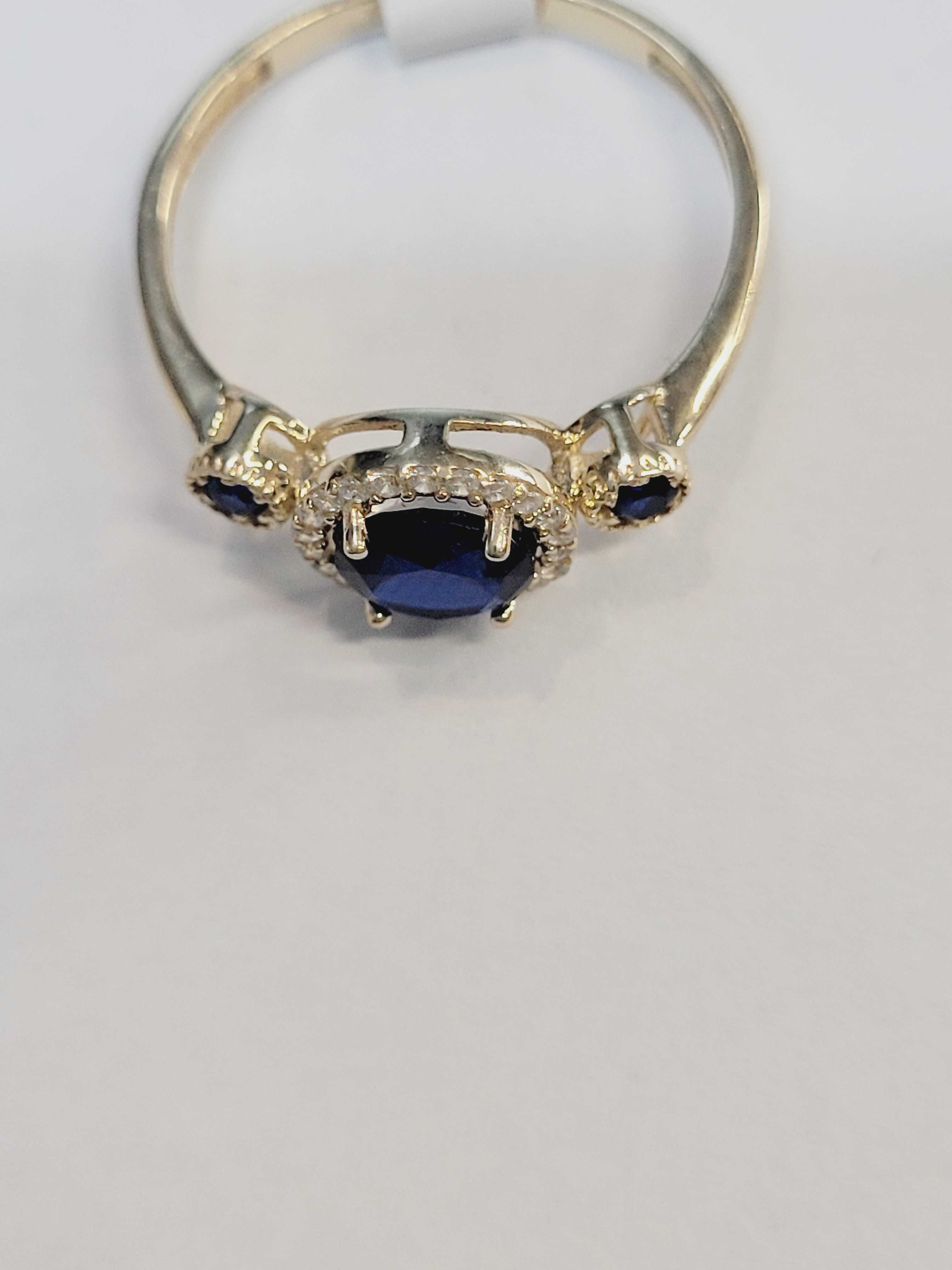 Złoty pierścionek  z niebieskimi cyrkoniami   SKLEP