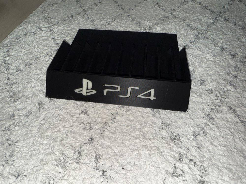 Stojak podstawka na gry PS4 napis fluorescencyjny