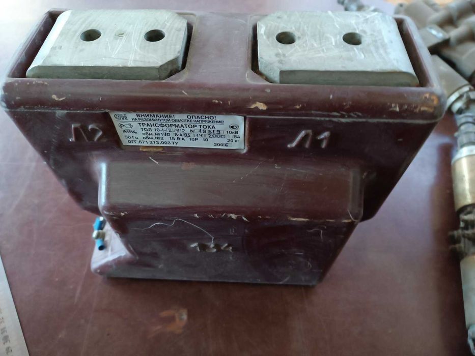 Трансформатор тока ТЗЛМ-1У2 0.66кВ 50Гц и тол10-1-2у2  10кВ литой