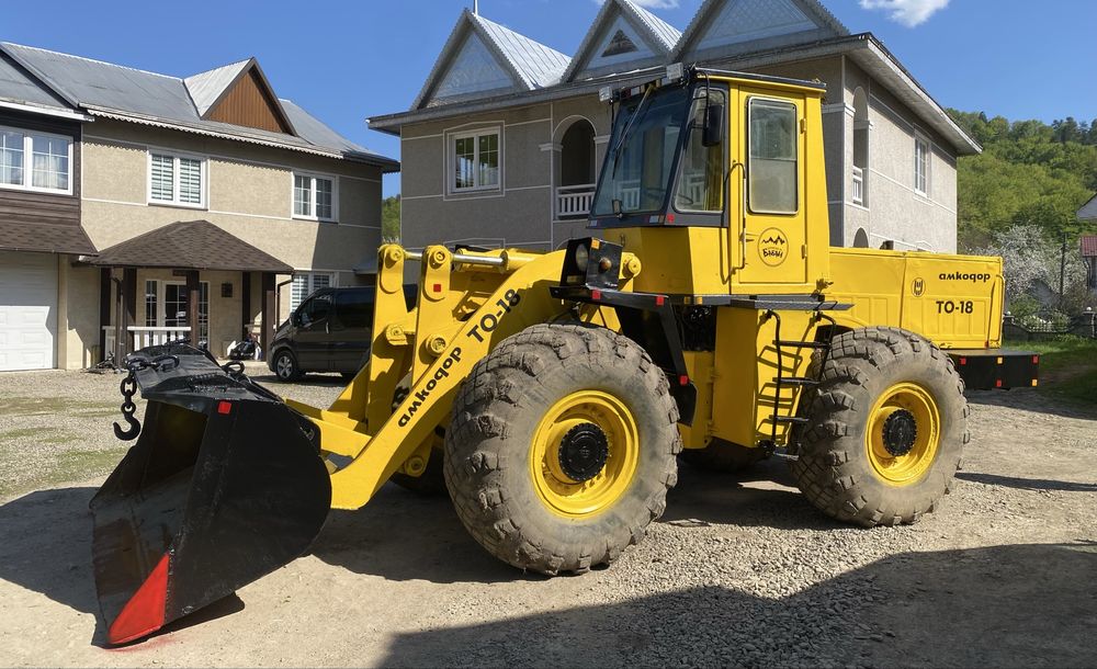 Амкадор ТО-18 навантажувач