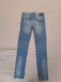Sprzedam spodnie jeansy Bershka 38