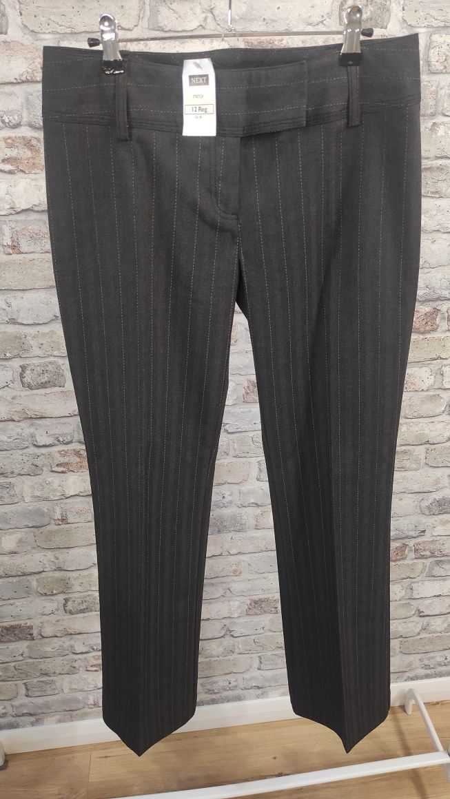 Nowe damskie eleganckie spodnie z kantem i z prostą nogawka