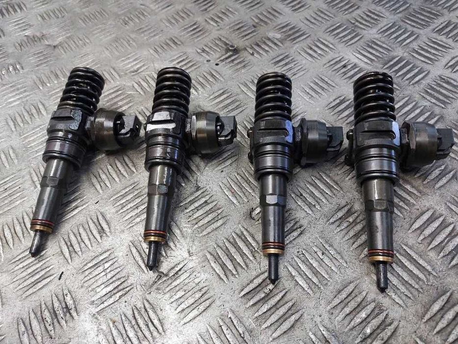 Pompowtryski pompowtryskiwacze Passat B6 2.0 TDI 140KM komplet