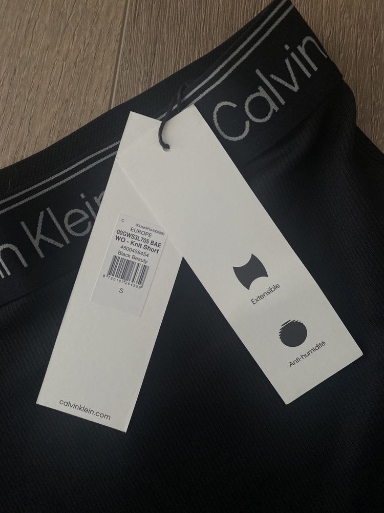 Czarne prążkowane kolarki bikery legginsy Calvin Klein Sport S