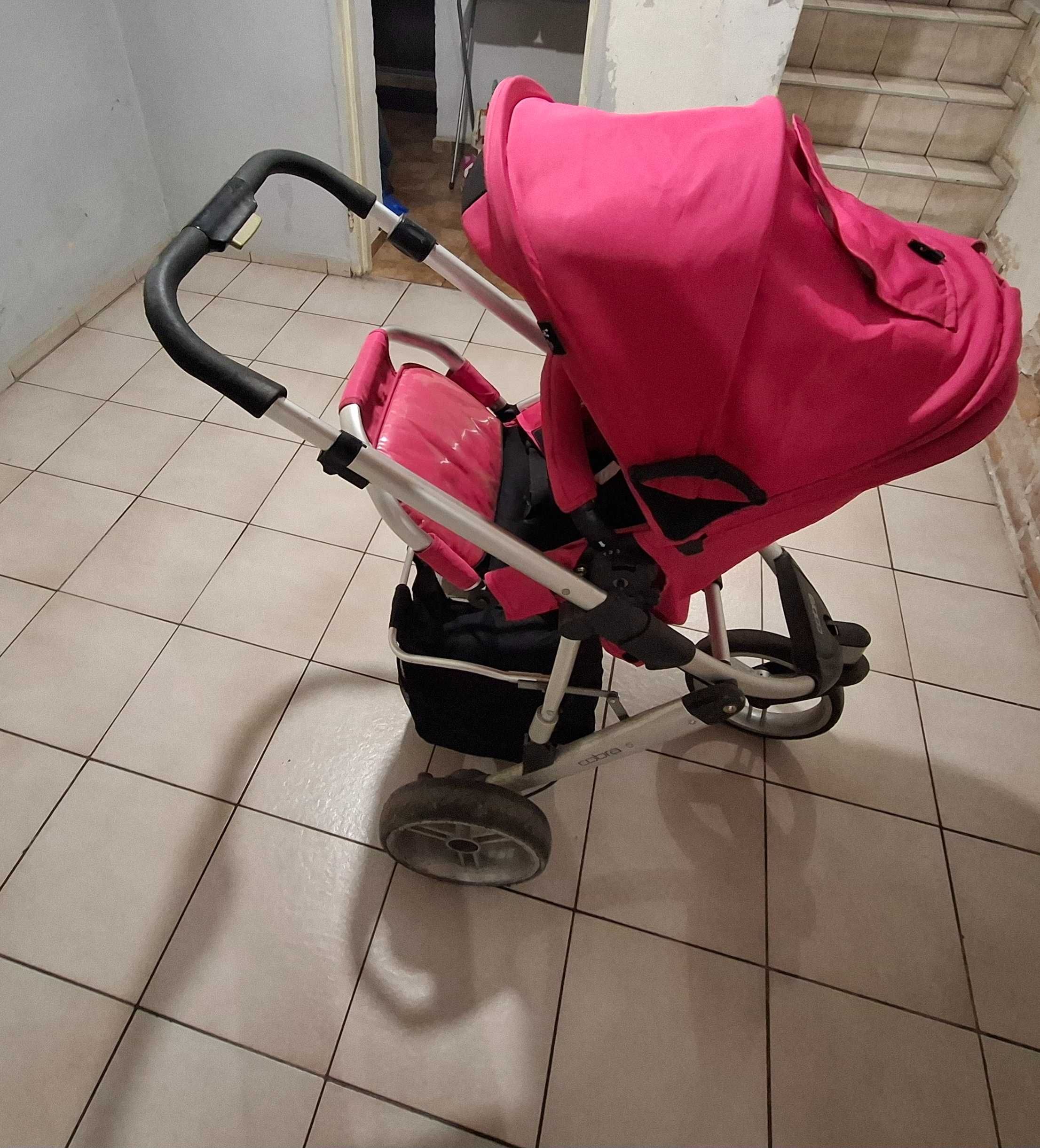 Sprzedam wózek dziecięcy 3w1 firmy Cobra kolor rózowo-czarny.