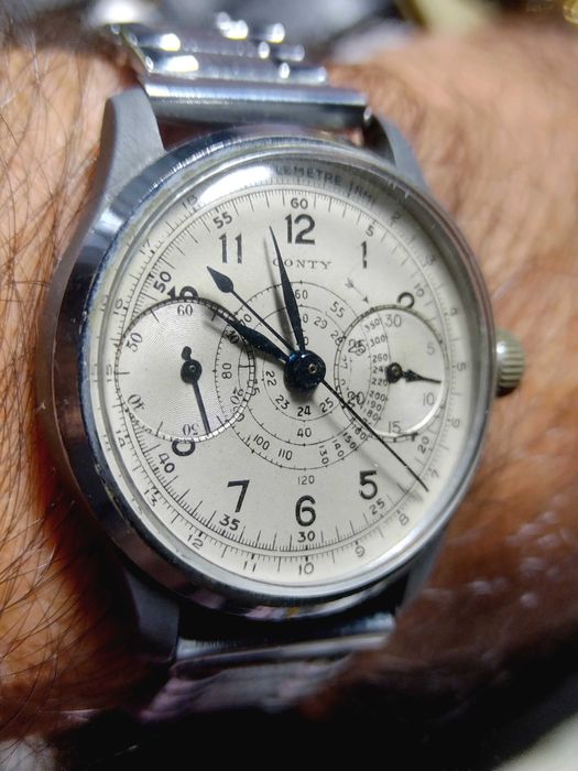 Raro cronógrafo CONTY flyback 34mm corda manual