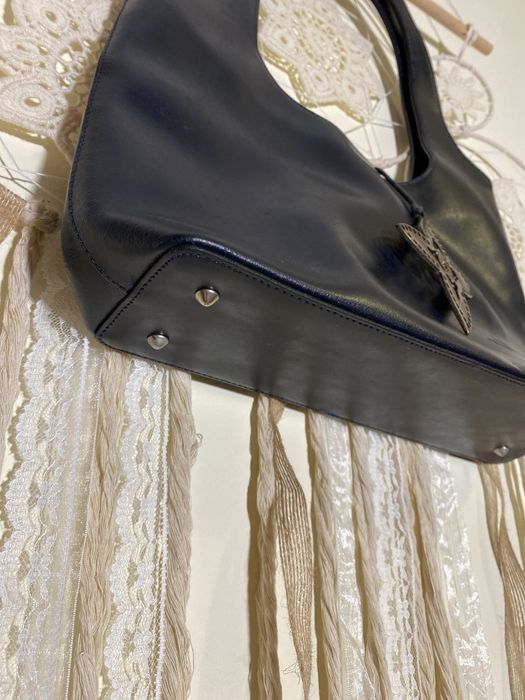 Mala em pele, azul marinho em muito bom estado