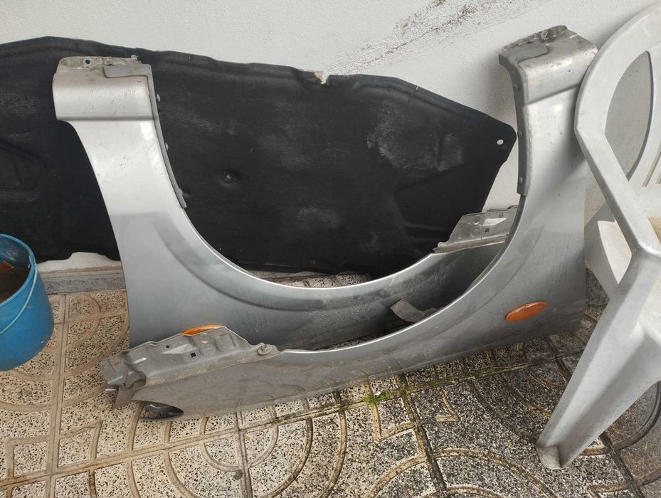 guarda-malas Nissan Almera II hatchback 1.5 dci