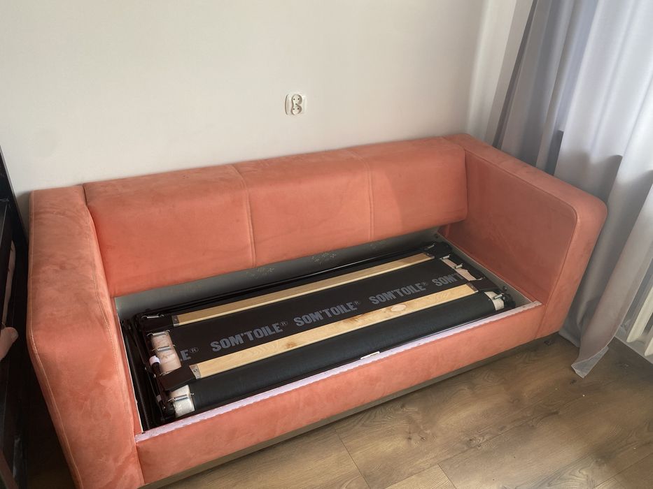 sofa rozkładana różowa