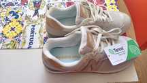 Ténis New Balance.  Modelo 574