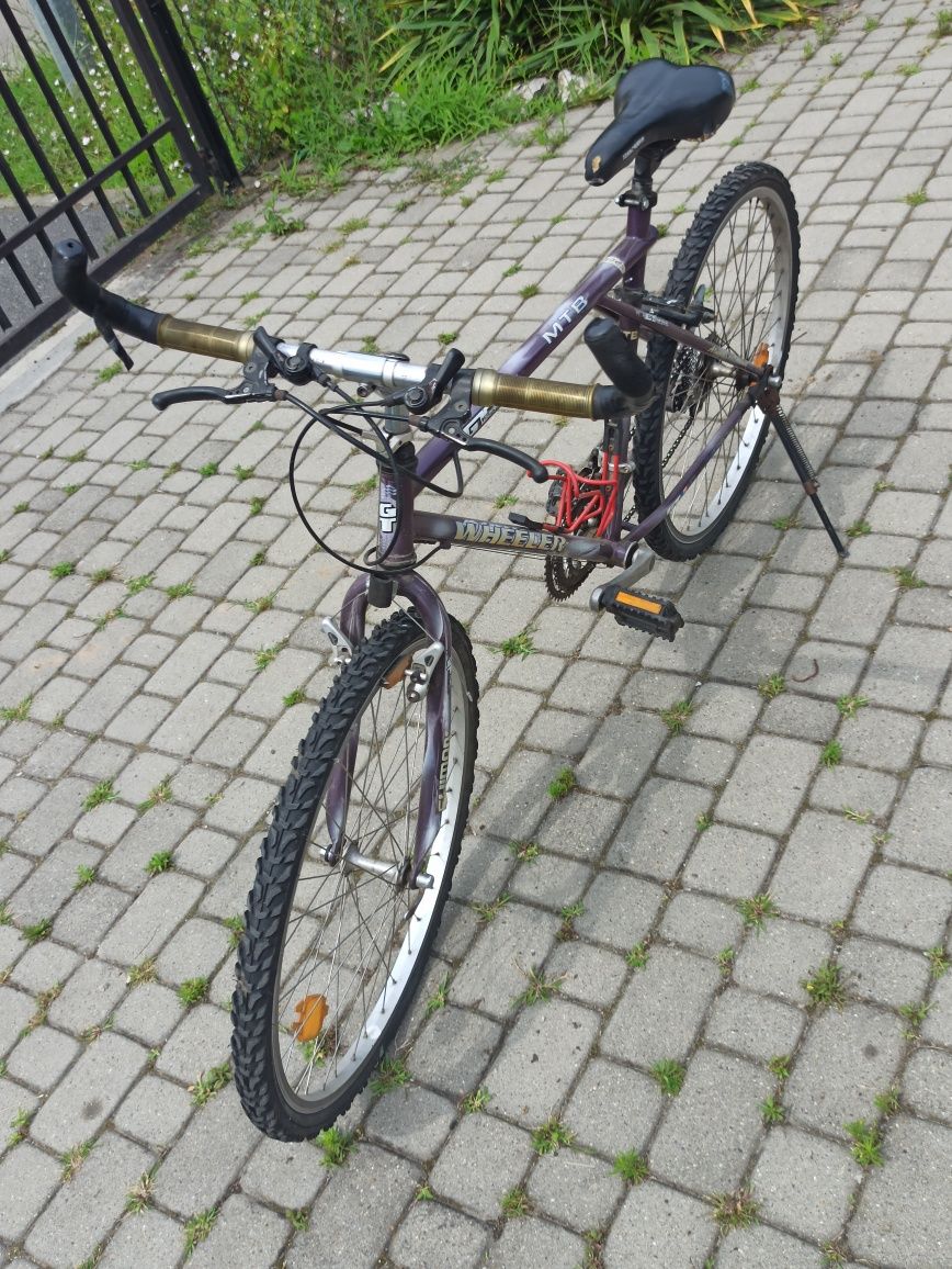 Rower górski MTB, terenowy, fioletowy.